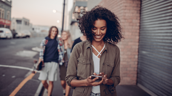 Young woman looking at mobile