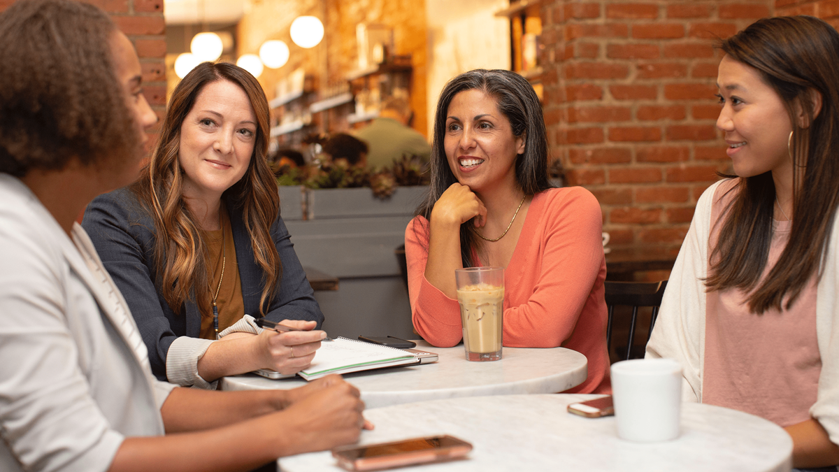 Women talking over coffee