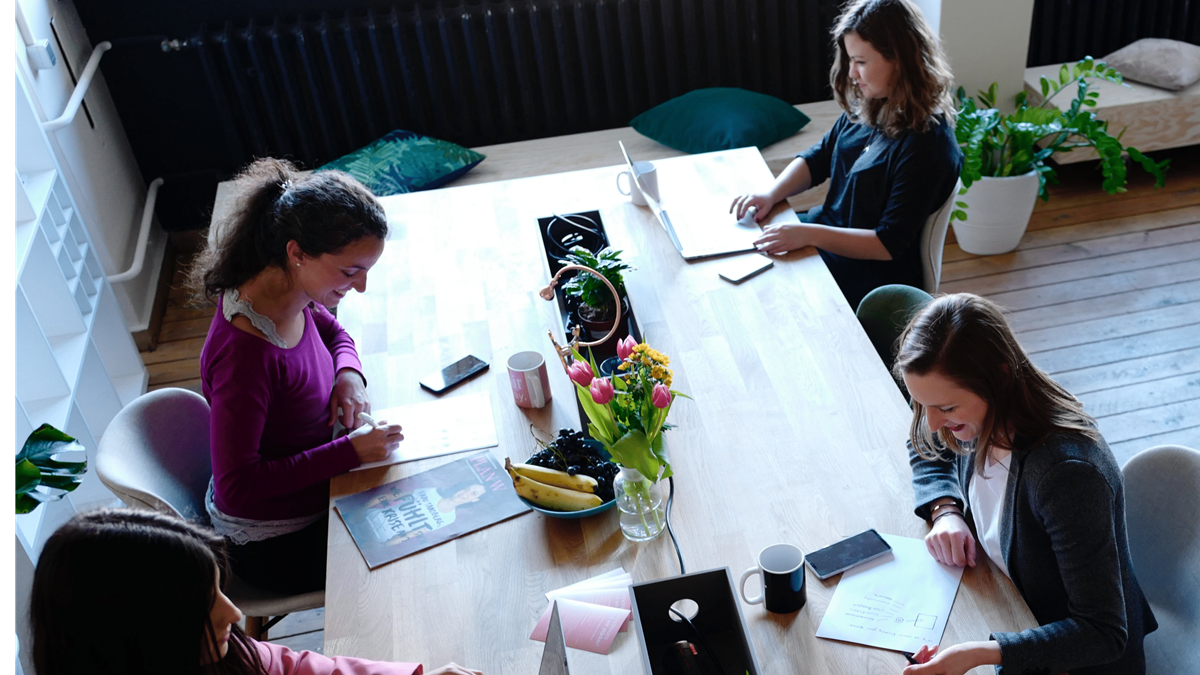 Women working at table