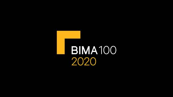 BIMA 100 badge black background yellow and white text