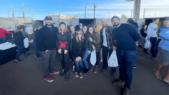 Group of Kin + Carta employees at volunteering event in Denver