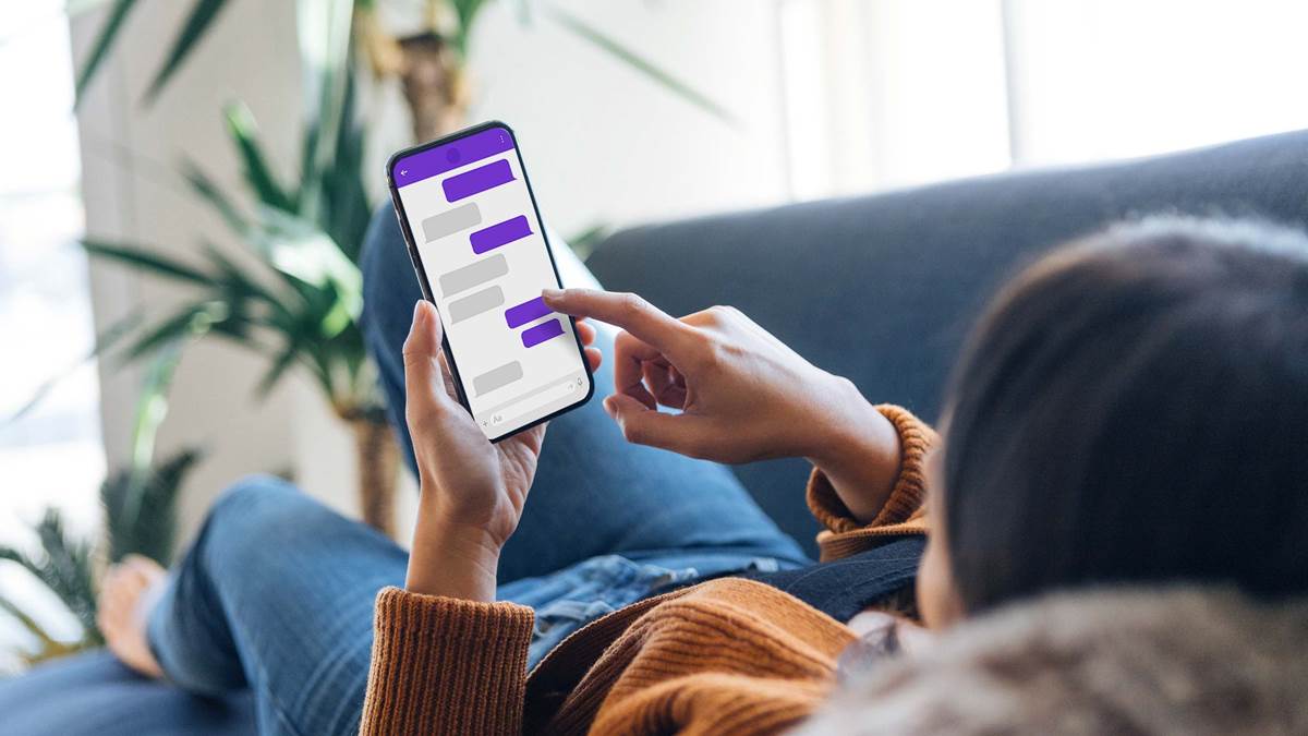 Woman ordering food through a mobile app with chatbot assistance