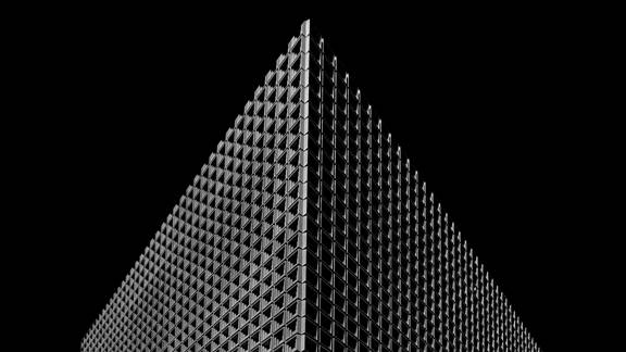 Abstract imagery of pyramid on black background