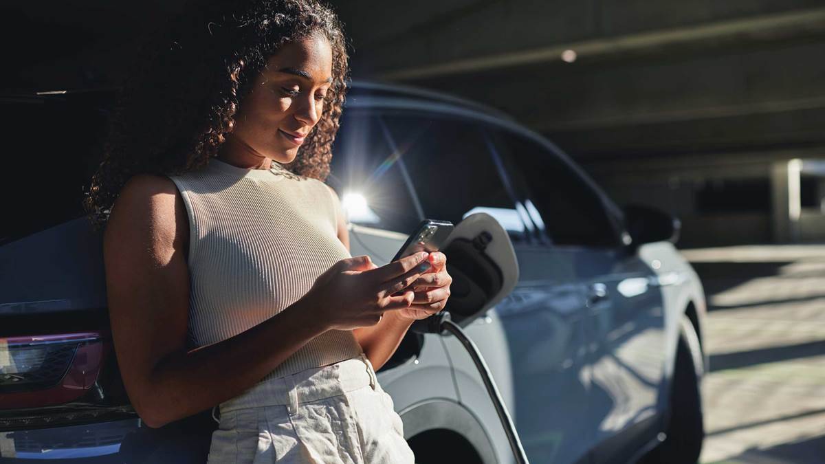 Person by electric car