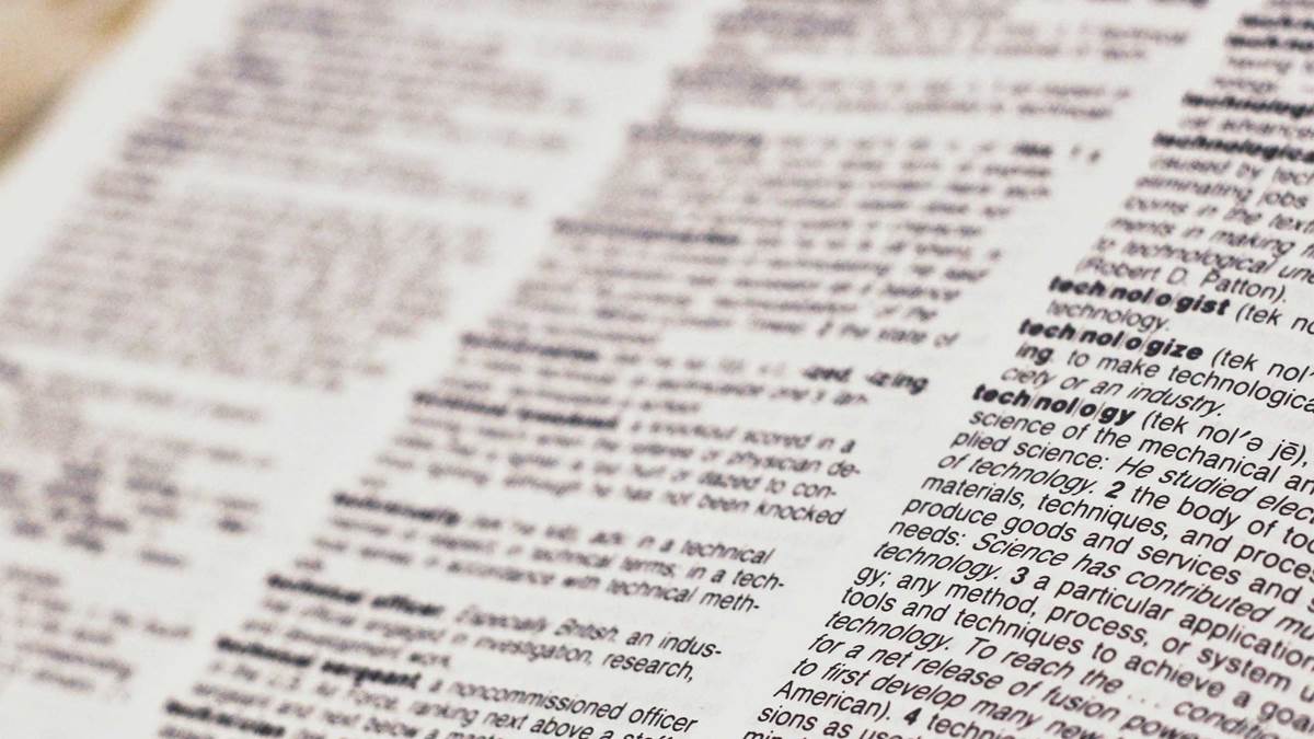 Zoom in on dictionary page with technology terms