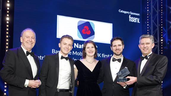 Bankline and Kin and Carta Create team on stage collecting award