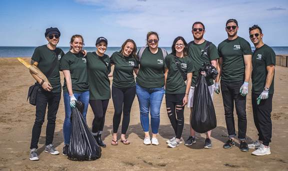 Volunteers collecting garbage at Montrose Beach